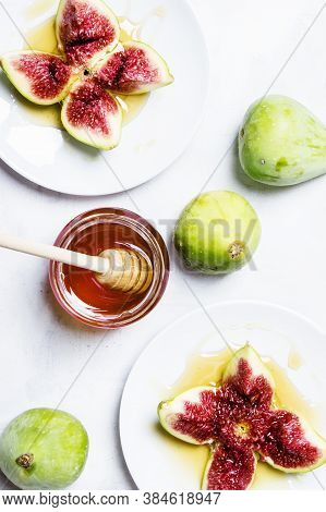 Green Figs With Honey, White Background, Top View