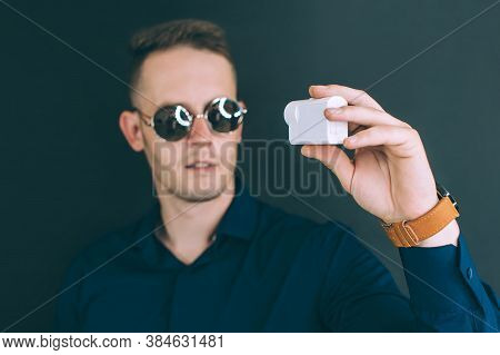 A Young Guy Shoots A Selfie With An Action Camera For An Online Video Conference.