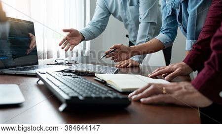 Team Of Programmer Working To Find Solution To Problem And Coding Technologies In A Software Develop