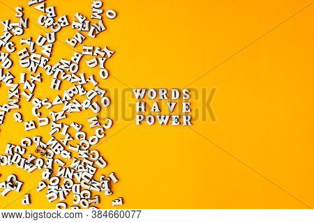 Quote Words Have Power Made Out Of Wooden Letters On Bright Yellow Background. Motivational Words Qu
