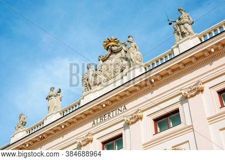Vienna, Austria - Oct 17, 2019: Side View Of Albertina Museum Building. Logo On The Wall. Statues Wi