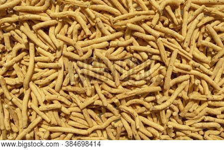 Ratlami Sev Background. Popular Gujarati Snack. Ratlami Masala Sev. Top View. Indian Street Snack.