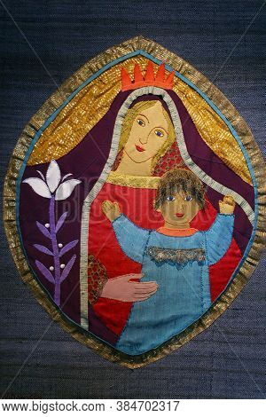 NALS, ITALY - APRIL 30, 2013: Virgin Mary with baby Jesus, tapestry in the chapel in Lichtenburg, Nals, Italy