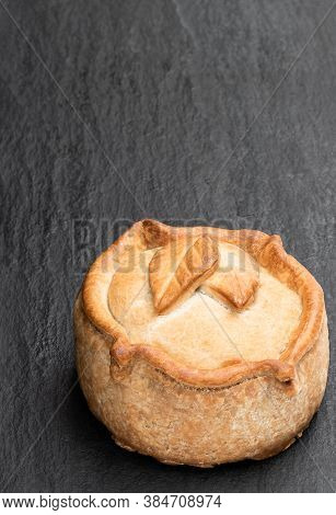 Seasoned  Cured Pork And Ham Pie On Stone Background