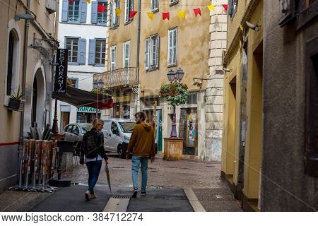 Foix, France : 2020 19 September : Two People In The The Saint Volusien Church From Foix ,france.