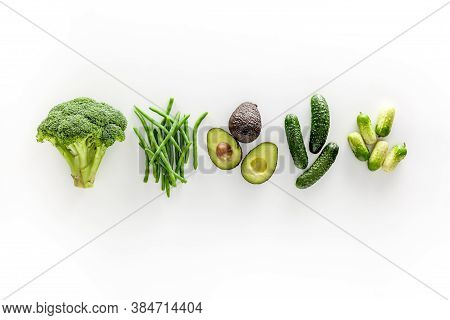 Greeny Cocktail Ingredients. Background. Сucumber, Avocado, Broccoli, Beans, Leek And Fresh Apple On