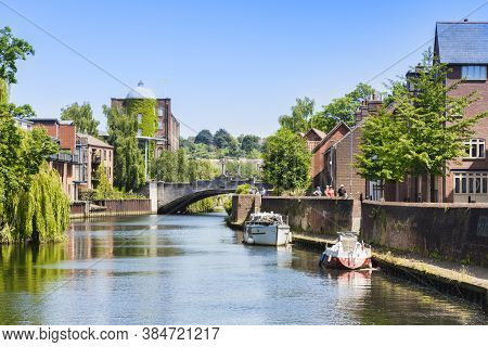 29 June 2019: Norwich, Norfolk, Uk - Tourists Walking Beside The River Wensum On A Sunny Summer Day.