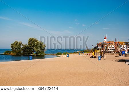 Urk Netherlands Harbor And Lighthouse Near The Beach On A Bright Summer Day Flevoland Urk Netherland