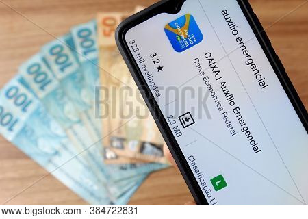Rio De Janeiro, Brazil - September 5, 2020: Emergency Aid (auxílio Emergencial) Logo On The Smartpho