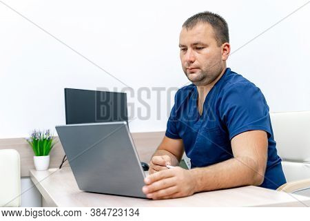 Male Medical Doctor Or Therapist Gives Online Consultation. Giving Diagnosis And Medical Treatment T