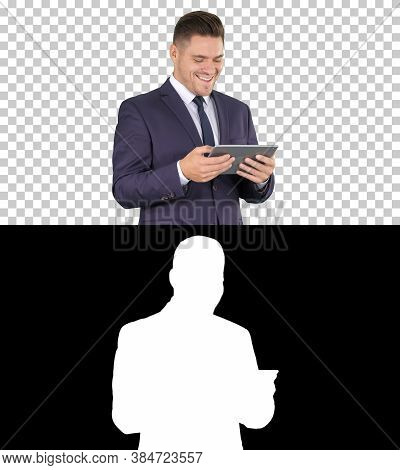 Businessman Reading Or Working On A Digital Tablet, Alpha Channe