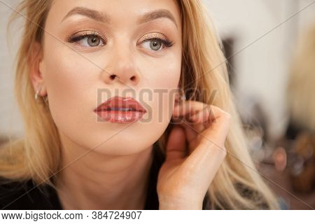 Close Up Of A Gorgeous Young Woman Looking Away Thoughtfully