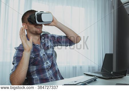 Happy Bearded Man Using Virtual Reality Goggles, Copy Space. Cheerful Male Student Having Fun, Using