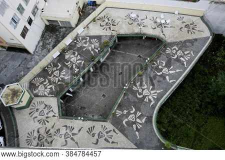Salvador, Bahia / Brazil - February 21, 2017: Sidewalk Decorated With Artwork By Artist Carybe Is Se