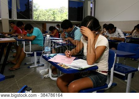 Ilheus, Bahia / Brazil - January 10, 2011: Young People Are Seen Taking Entrance Exams At The State 