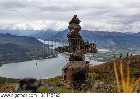 Cairns Rocks On Top Of A Mountain During Cloudy Day. Taken In Carcross, Near Whitehorse, Yukon, Cana