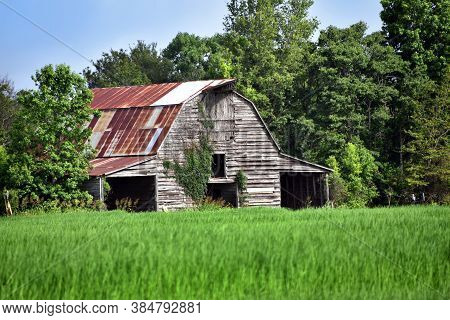 Barn Has Rusting Tin Roof