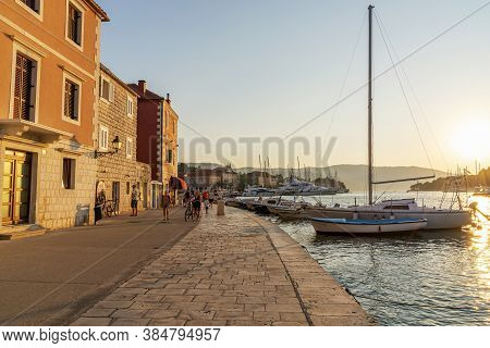 Stari Grad Croatia - 12 August 2020: Embankment Of Stari Grad Town On The Hvar Island With Walking P
