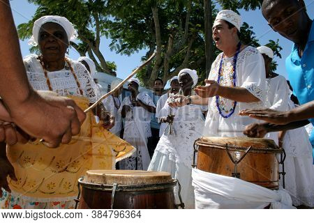 Santo Amaro, Bahia / Brazil - May 13, 2007: Candomble Supporters Are Seen During A Delivery Of Offer