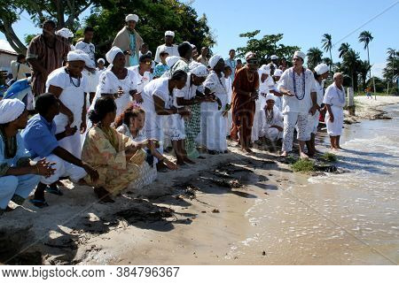 Santo Amaro, Bahia / Brazil - May 13, 2007: Candomble Supporters Are Seen During A Delivery Of Offer