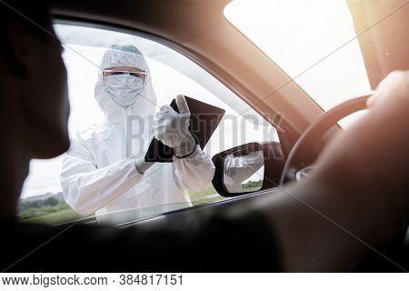Checking And Disinfecting Car For Virus Covid-19 And Bubonic Plague Border Of City And Country. Doct