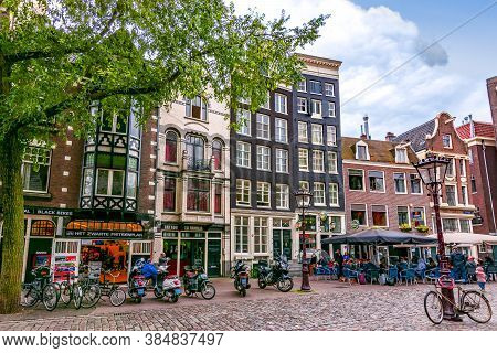 Architecture Of Amsterdam Near Old Church (oudekerk), Netherlands - June 2018