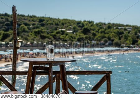 Peschici, Gargano, Puglia, Italy, July 2020: Wooden Table With Panoramic Views Of The Gargano Coast.