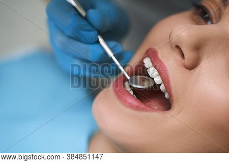 Young Girl During Dental Examination Stock Photo