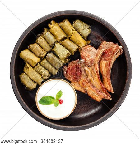 Top View On Dish Of Azrbaydzhan Cuisine With Dolma Lamb Entrecote Isolated On White