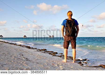 Male Backpacker Looking At The Sea, Jardines Del Rey / Cuba