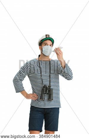 Recording Voice. Caucasian Male Sailor In Uniform On White Studio Background. Young Man Using Modern