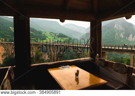 View From The Cafe On The Mountain, Beautiful And Impressive Landscape Of The Mountains And The Brid