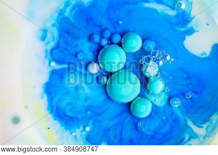 Multicolor Abstract Background Made Of Liquid And Oil. Transparent And Color Paints.
