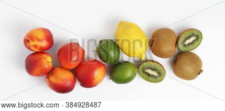 Fruit Mix On A White Background. Kiwi Nectarine Lemon Lime. Top View