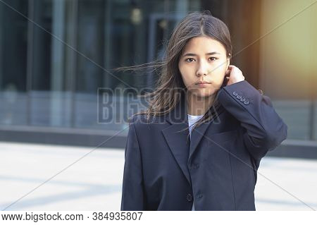 Portrait Of A Sad Asian Attractive Woman Standing Outside. Ethnic Happy Woman, Formally Dressed, Bus
