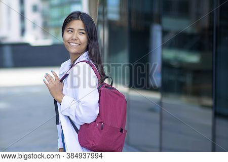 Happy Smiling Asian Woman, Female Student Goes To Class. Copy Space.