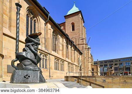 Heilbronn, Germany - September 2020: Sculpture Called 'christophorus' With Gothic Hall Church St. Ki