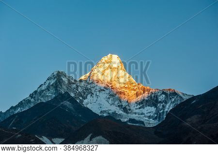 Sunrise On Ama Dablam Peak Mountain. Trekking In Nepal Himalayas. Ebc (everest Base Camp Trek) Trail