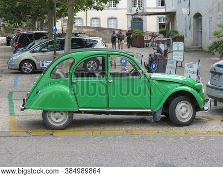 Carcassonne, France - Circa August 2018: Green Citroen 2cv Car