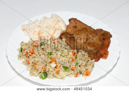 Brown rice with fisch and vegetable. The healthy diet