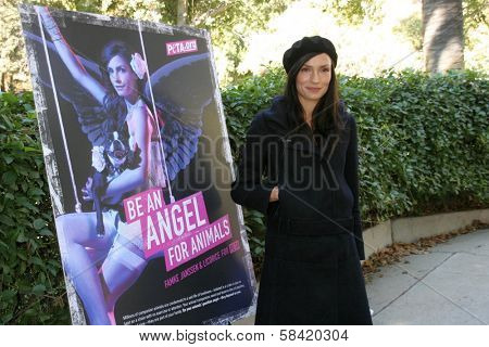 HOLLYWOOD - DECEMBER 19: Famke Janssen at the press conference for PETA, Runyon Canyon Park December 19, 2006 in Hollywood, CA