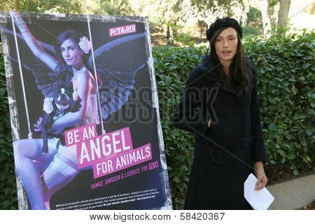 HOLLYWOOD - DECEMBER 19: Famke Janssen at the press conference for PETA, Runyon Canyon Park December 19, 2006 in Hollywood, CA