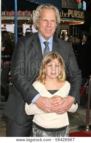 WESTWOOD, CA - DECEMBER 07: Steve Tisch and his daughter at the premiere of 