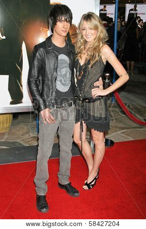WESTWOOD, CA - DECEMBER 07: Chad Rogers and Victoria Salsbury at the premiere of 