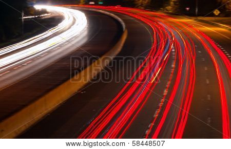 Headlight And Taillight Trails On A Busy Highway At Night