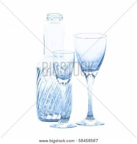 Wine glasses and bottle isolated on white