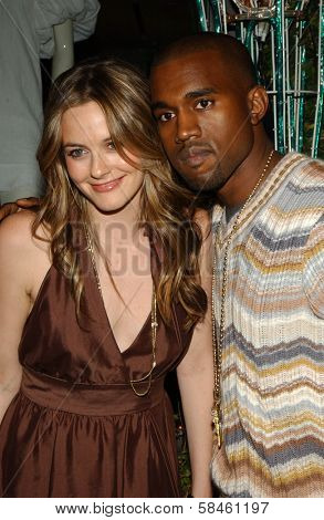 Alicia Silverstone and Kanye West Holiday Window Lighting to benefit the Kanye West Foundation Loop Dreams Program, Stella McCartney Boutique, Los Angeles, CA, December 5, 2006.