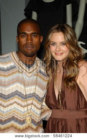 Alicia Silverstone and Kanye West Holiday Window Lighting to benefit the Kanye West Foundation Loop Dreams Program, Stella McCartney Boutique, Los Angeles, CA, December 5, 2006.