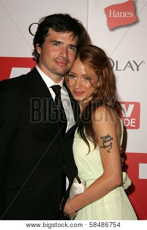 HOLLYWOOD - AUGUST 27: Matthew Settle and friend at the TV Guide Emmy After Party August 27, 2006 in Social, Hollywood, CA.