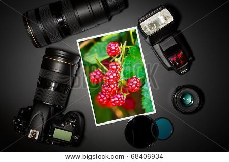 Camera Lens And Image On Black Background